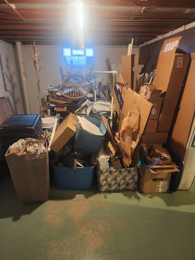 Roll-off dumpster container at job site for 4 Yard Dumpster Rental in Palm City